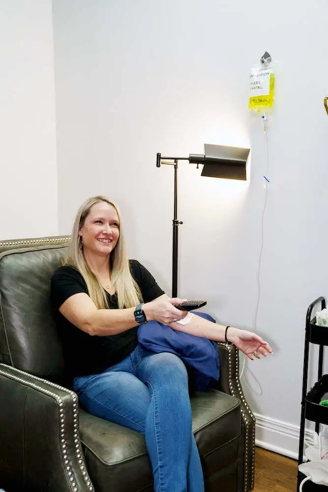 Client relaxing during IV therapy at The Hydration Station